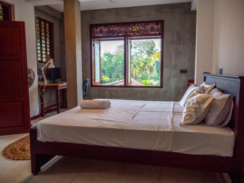 Katil atau katil-katil dalam bilik di Ceylon Stays Hiriketiya