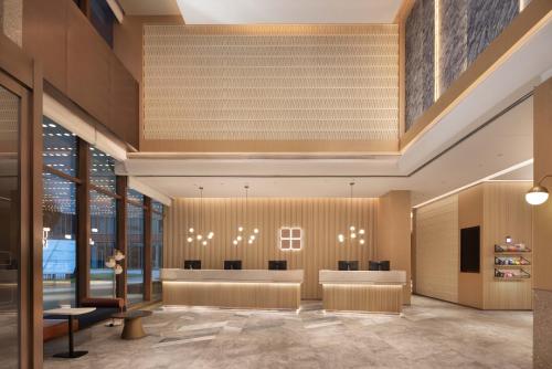 Ο χώρος του λόμπι ή της ρεσεψιόν στο Hilton Garden Inn Jingdezhen Taoyuan Valley
