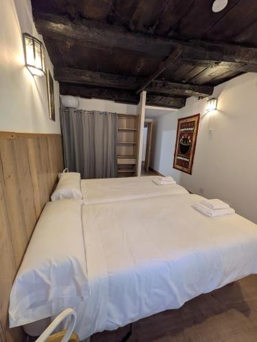 Postel nebo postele na pokoji v ubytování Casa Xauri