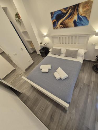 Ένα ή περισσότερα κρεβάτια σε δωμάτιο στο Annita's Rooms