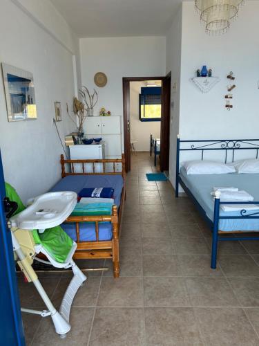 Ένα ή περισσότερα κρεβάτια σε δωμάτιο στο Apartments by the sea