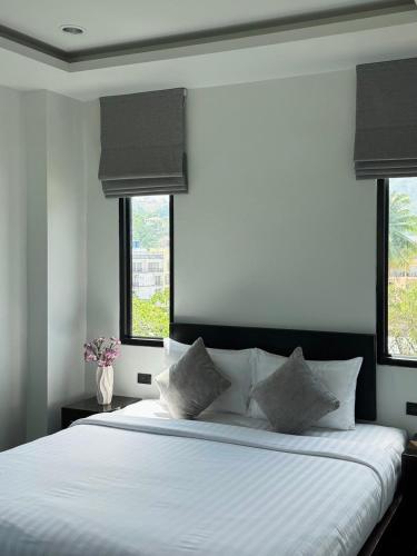 Katil atau katil-katil dalam bilik di Ice Kamala Beach Hotel