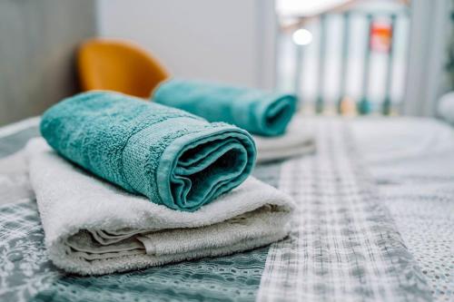 Posteľ alebo postele v izbe v ubytovaní Apartamenty Majer Łeba