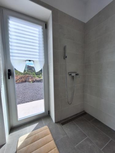 Ванная комната в Villa PermaVista in Alleinlage und mit Infinity-Pool auf der Sonnenseite