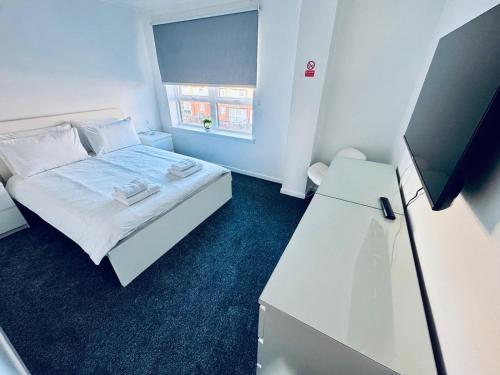 Postel nebo postele na pokoji v ubytování Modern 2 bedroom Apartment Near City Centre