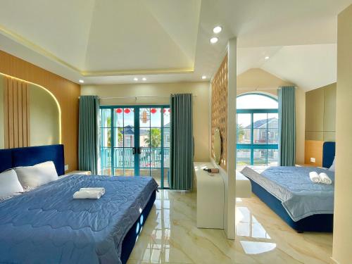 Ένα ή περισσότερα κρεβάτια σε δωμάτιο στο Villa Novaworld 2 Phòng Ngủ