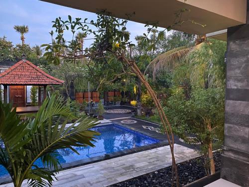 Kolam renang di atau dekat dengan Villa Indah Anugrah