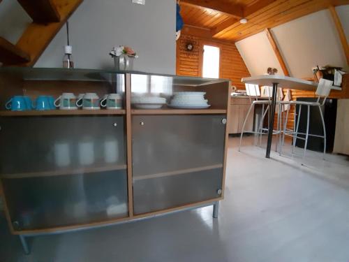 Kuchyň nebo kuchyňský kout v ubytování Fábián Apartman