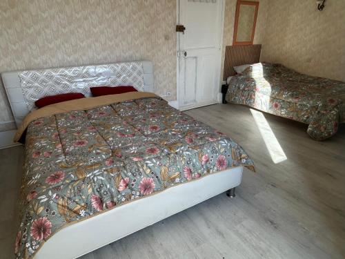 Postel nebo postele na pokoji v ubytování Chambre 3