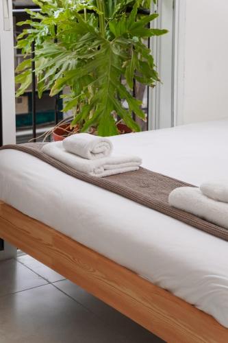 Cama o camas de una habitación en Loveinsky Tel Aviv rooms