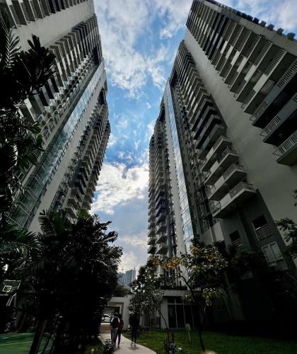 two tall buildings standing next to each other at Kasara Serenity Condotel in Manila