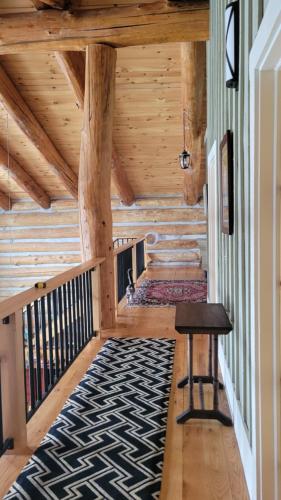 Ένα ή περισσότερα κρεβάτια σε δωμάτιο στο Firefly Creek Lodge