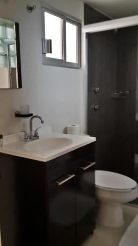 Ванная комната в Grupo Kings Suites -Monte Chimborazo 537