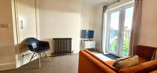 TV o dispositivi per l'intrattenimento presso Thompson Apartments by Switchback Stays