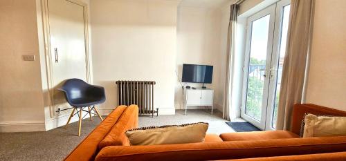 TV o dispositivi per l'intrattenimento presso Thompson Apartments by Switchback Stays