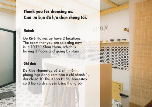 a sign on a wall in a room at De Rivé Homestay Cần Thơ in Can Tho