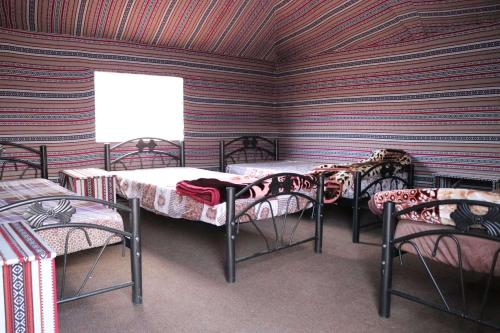 Llit o llits en una habitació de Bedouins nights