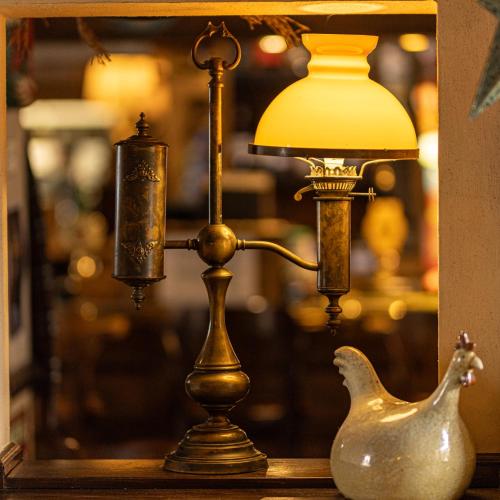 a lamp and a vase on a table at The Plough Inn in York