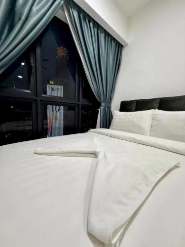 Agile SkyView Suites KLにあるベッド