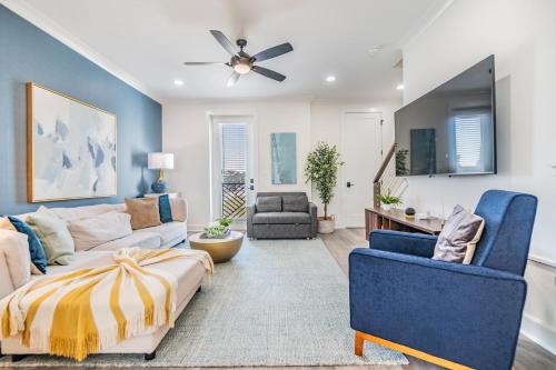 a living room with a couch and two chairs at Luxury Stylish 3BR Oasis - Tampa Retreat in Tampa