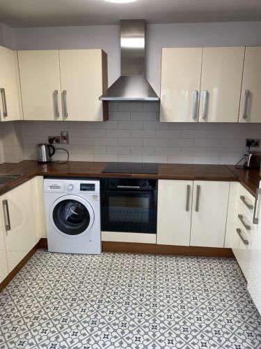 Kuchyň nebo kuchyňský kout v ubytování Holiday apartment Tralee