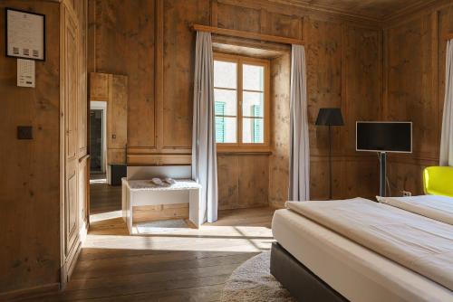 Ca' del Borgo, Rooms & Suitesにあるテレビまたはエンターテインメントセンター