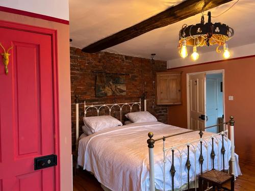 Moonfleet Boutique Hotelにあるベッド