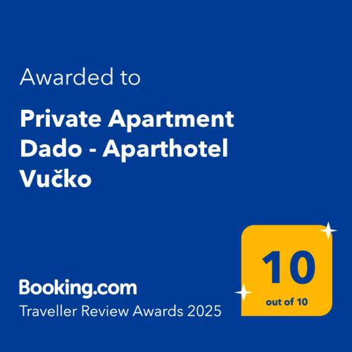 a yellow sign with the text awarded to private apartment data architect at Private Apartment Dado - Aparthotel Vučko in Jahorina