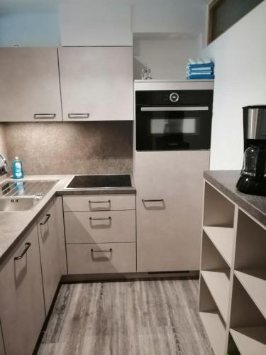 Kuchyň nebo kuchyňský kout v ubytování Haus Romantik