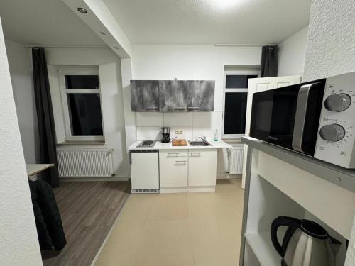 Kuchyň nebo kuchyňský kout v ubytování Ferienwohnung in Leipzig