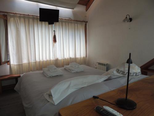 Cama o camas de una habitación en Cabañas Añahue