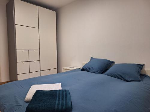 Postel nebo postele na pokoji v ubytování Maison Rustrel entre ocres et lavandes 3 chambres