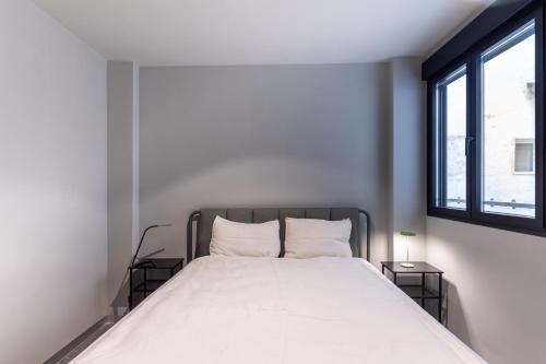 Postel nebo postele na pokoji v ubytování Modern design apartment in Murcia