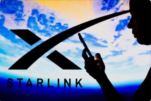 a person standing in front of a starlink logo at Cabañas Tucan Eco Hotel in Capurganá