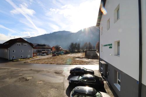 a row of parking meters on the side of a building at Pöckau 32 Smart Rooms Self Check In in Arnoldstein