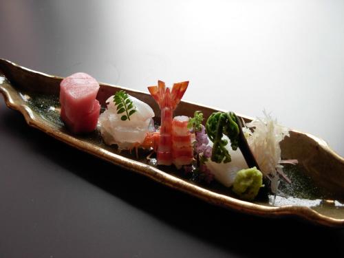a plate of food sitting on a table at Yoshimatsu in Hakone