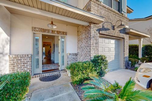 a house with a door and a garage at Mariner's Landing 602 in Saint Simon Mills