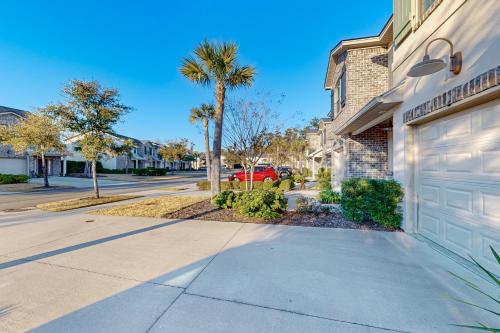 a street with a house and a garage at Mariner's Landing 602 in Saint Simon Mills