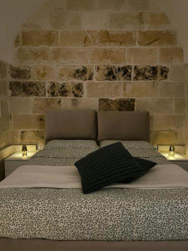 Ένα ή περισσότερα κρεβάτια σε δωμάτιο στο Casa Regina