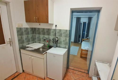 Una cocina o cocineta en Vojinovic Apartments
