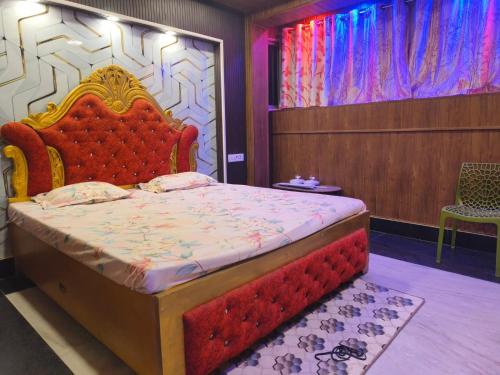 Ένα ή περισσότερα κρεβάτια σε δωμάτιο στο Hotel Maharaja Palace