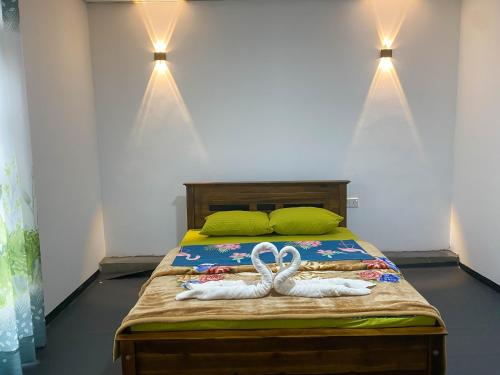 Postel nebo postele na pokoji v ubytování S and D Home Stay