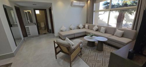 Un lugar para sentarse en شالية كنف الفندقي