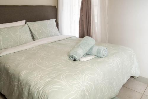 Postel nebo postele na pokoji v ubytování Making Memories Apartment