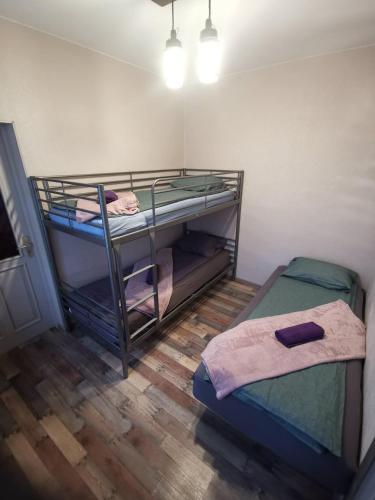 Postel nebo postele na pokoji v ubytování Alejas KAMBARI