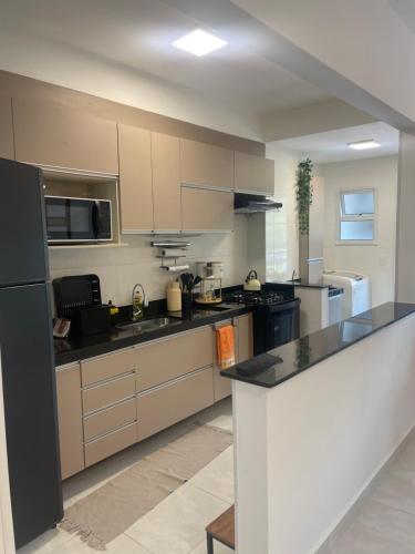Dapur atau dapur kecil di Apartamento no centro
