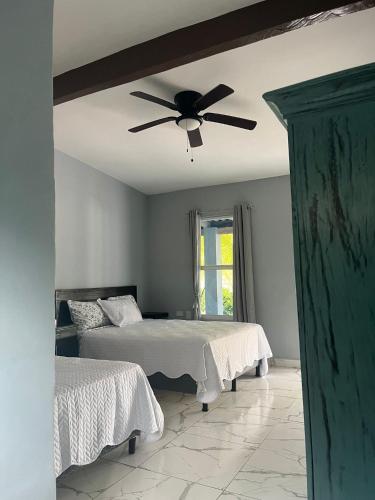Llit o llits en una habitació de Boni Beach