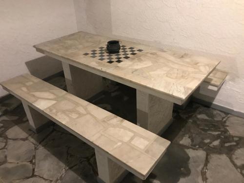 a table with a chess board on top of it at Large 2 floors in Carrasco in Montevideo
