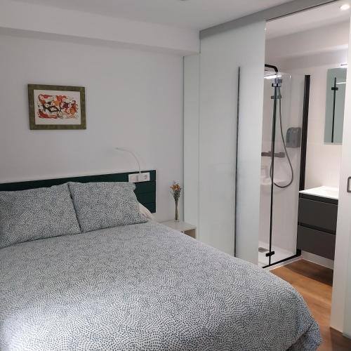 Postel nebo postele na pokoji v ubytování Adiva Suite