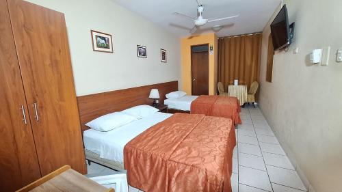 Postel nebo postele na pokoji v ubytování Hostal Bona Nit